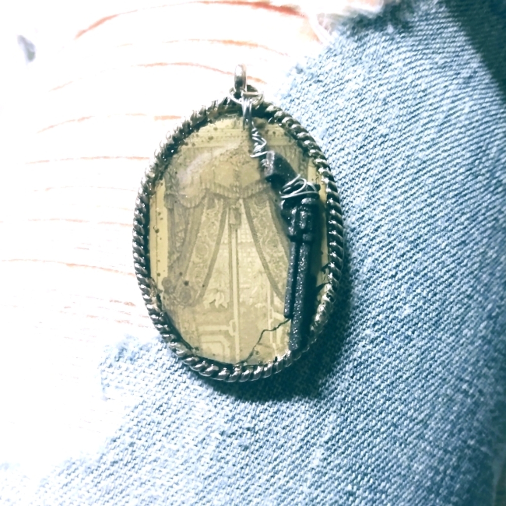 'In the parlor with the pistol' pendant